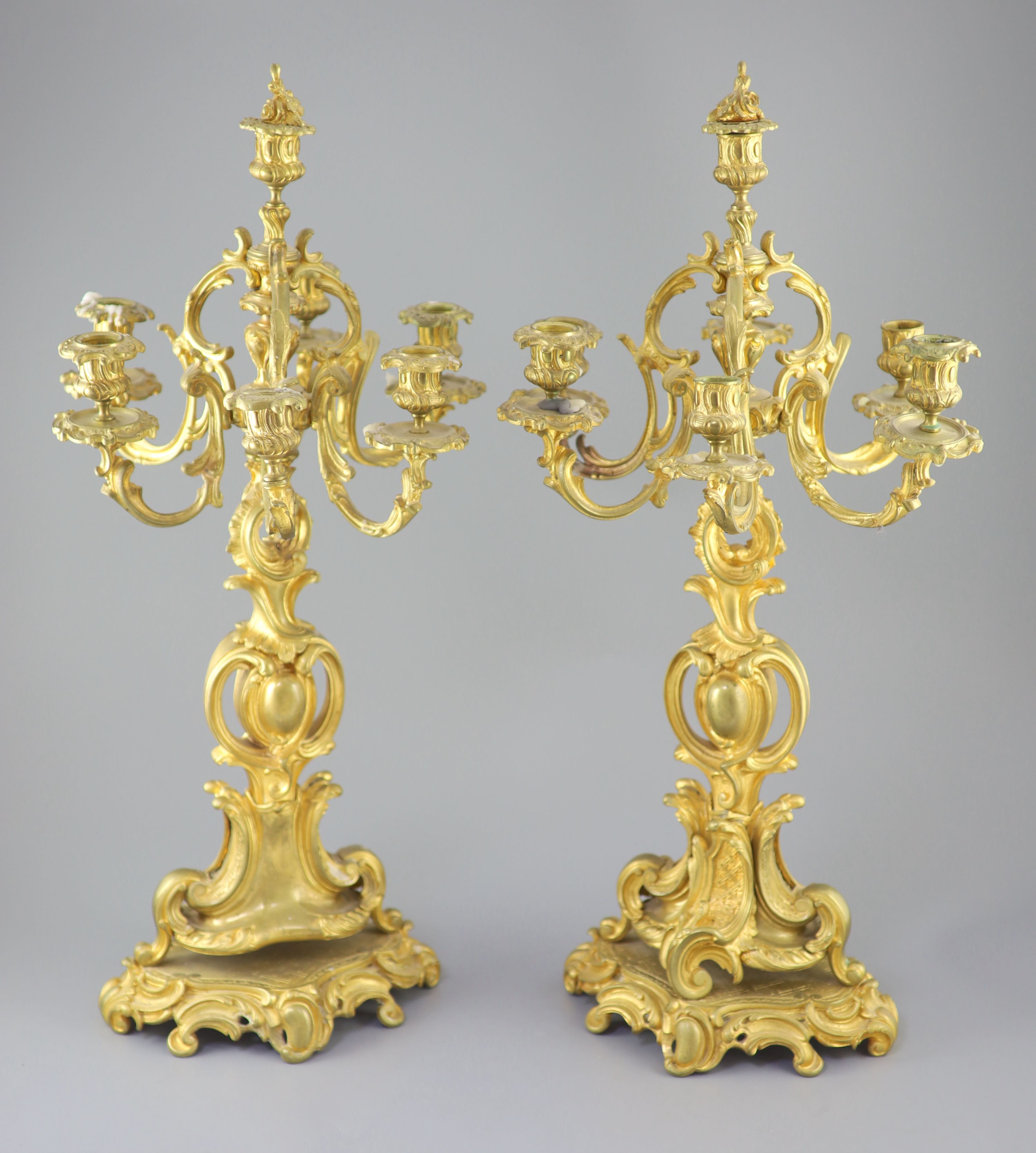 A pair of late 19th century French Louis XV style ormolu seven light candelabra, height 26in.
